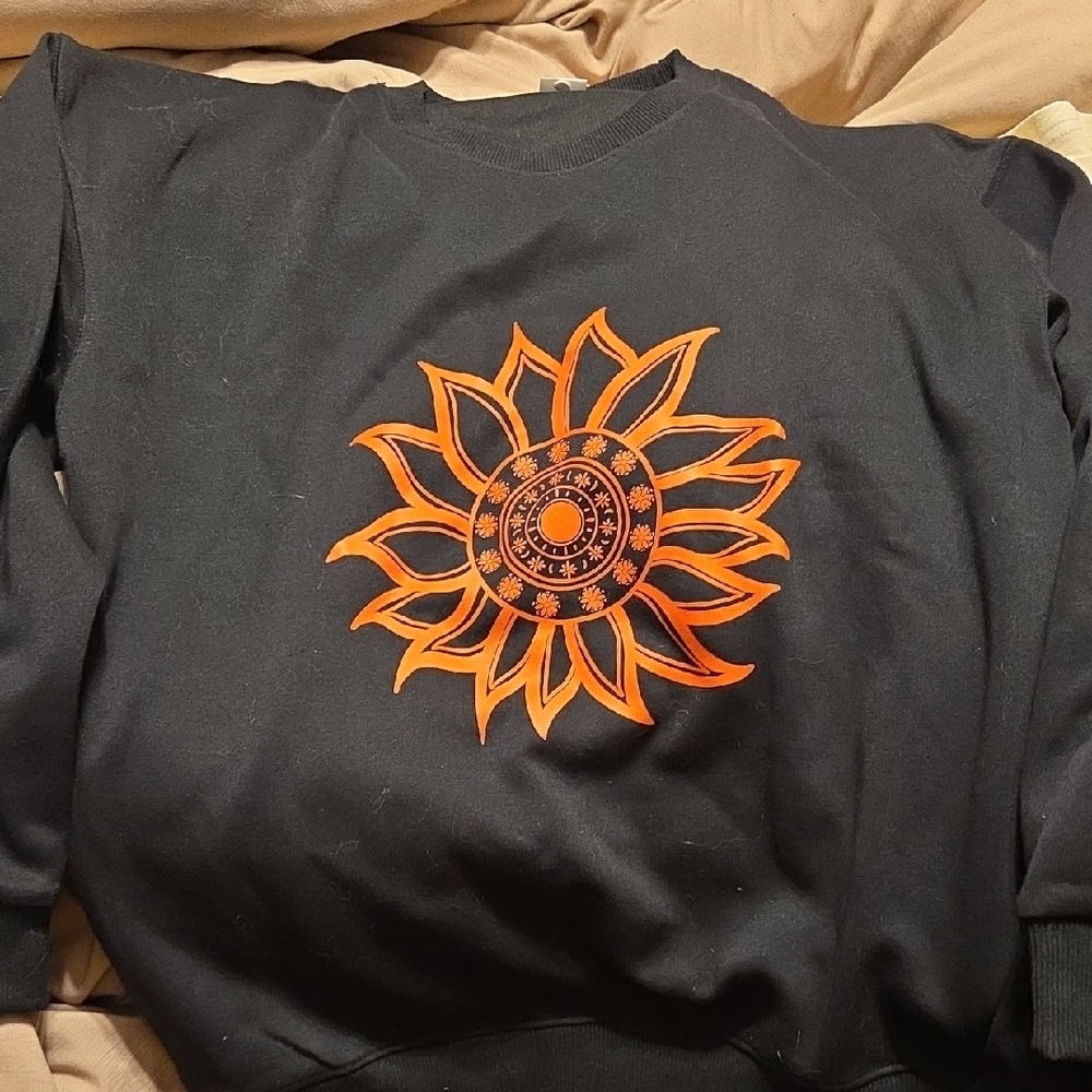 Black Sweatshirt with Orange Sun Design